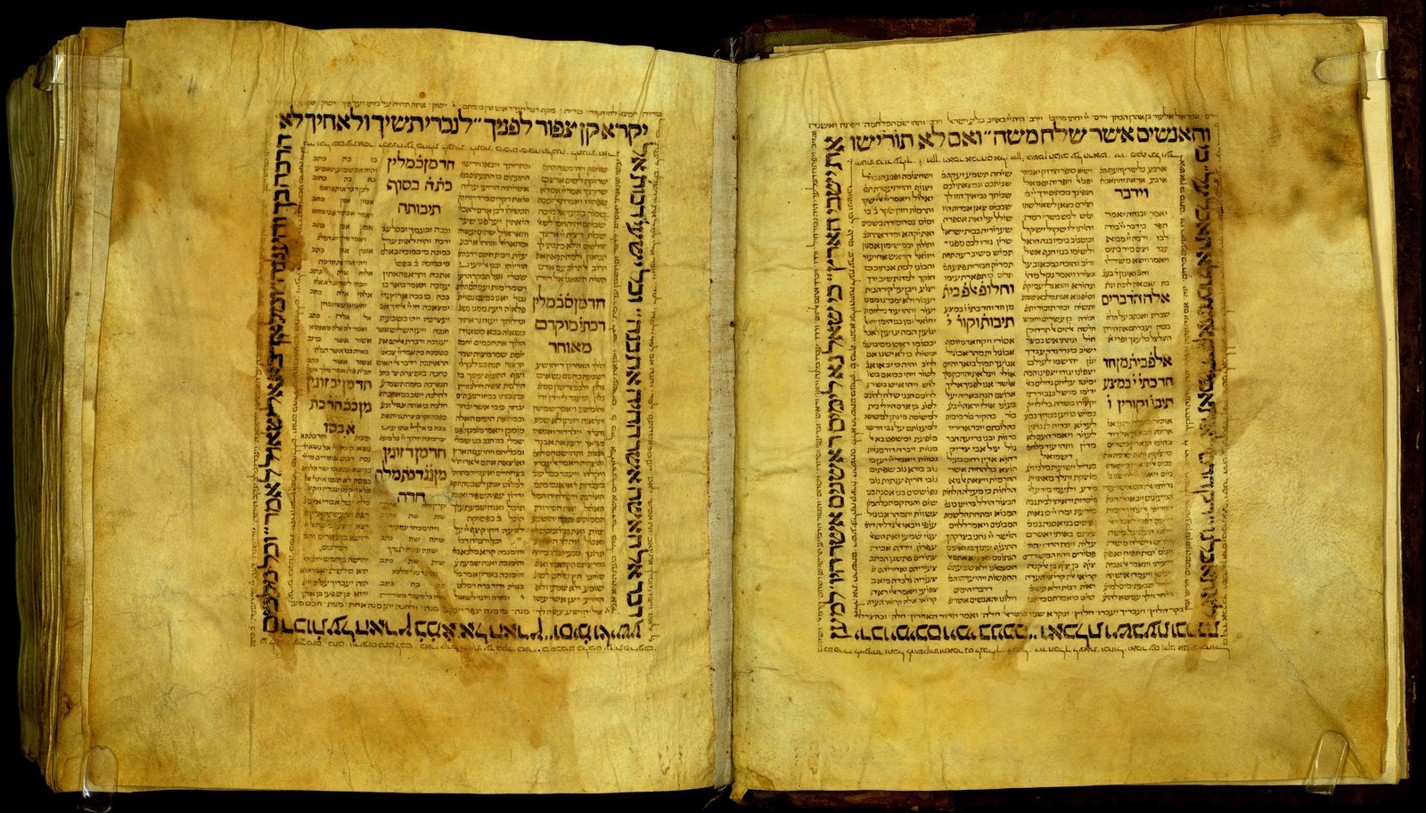 Page from the Damascus Pentateuch with three-column Hebrew text and Masorah marginalia.