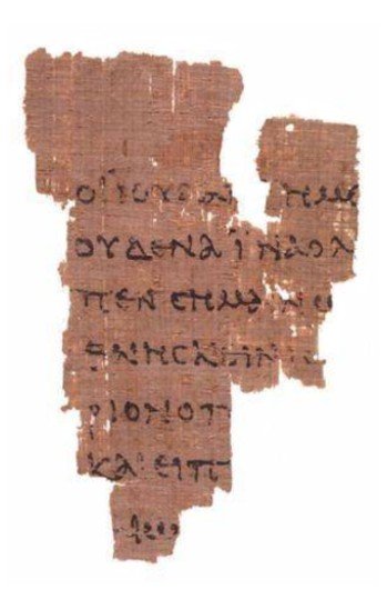 Recto side of Papyrus 52, the Rylands Fragment, showing John 18:31-33 in Greek.