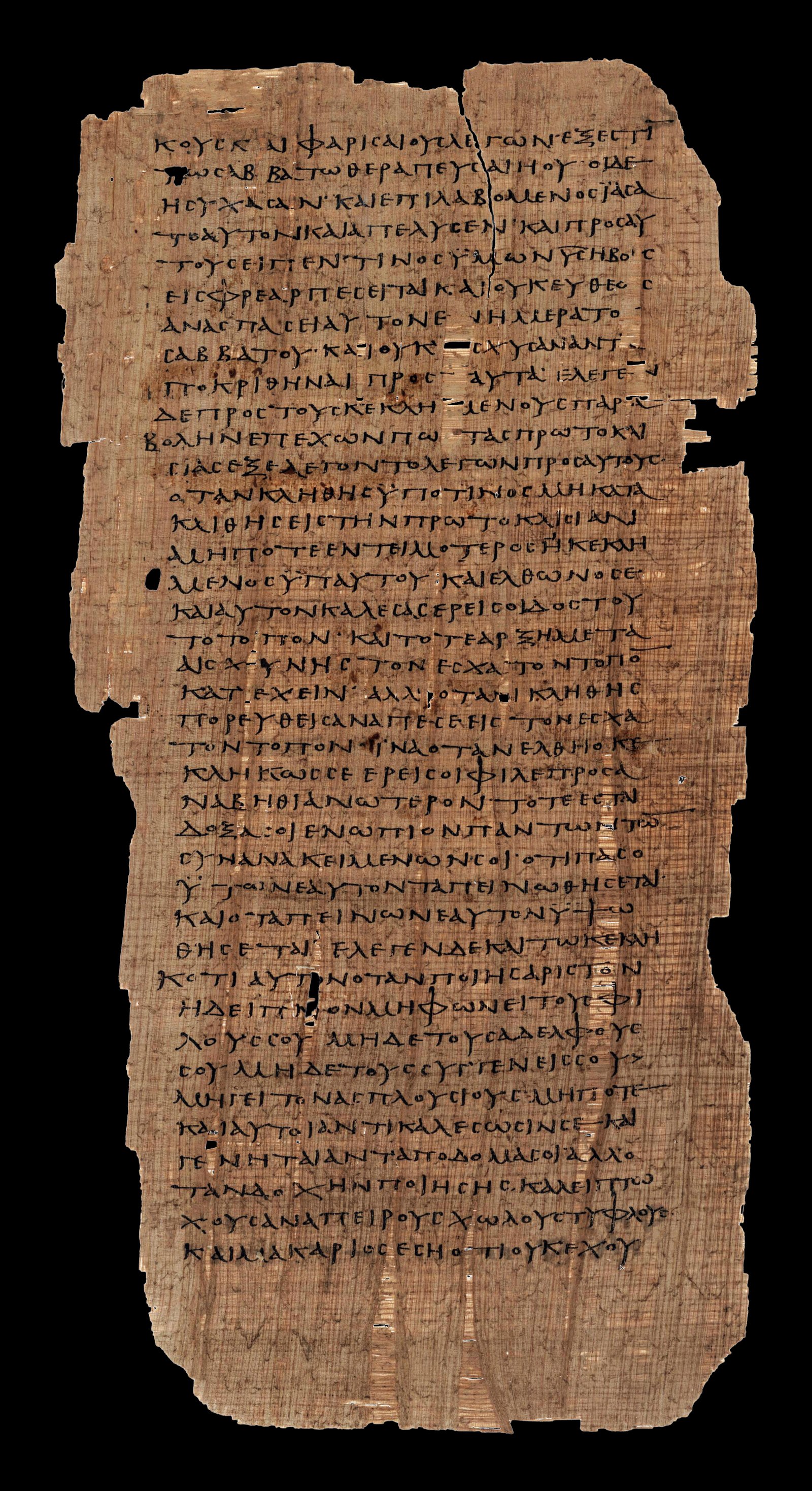 Folio of Papyrus 75 showing Greek text of Luke 14 in early uncial script.